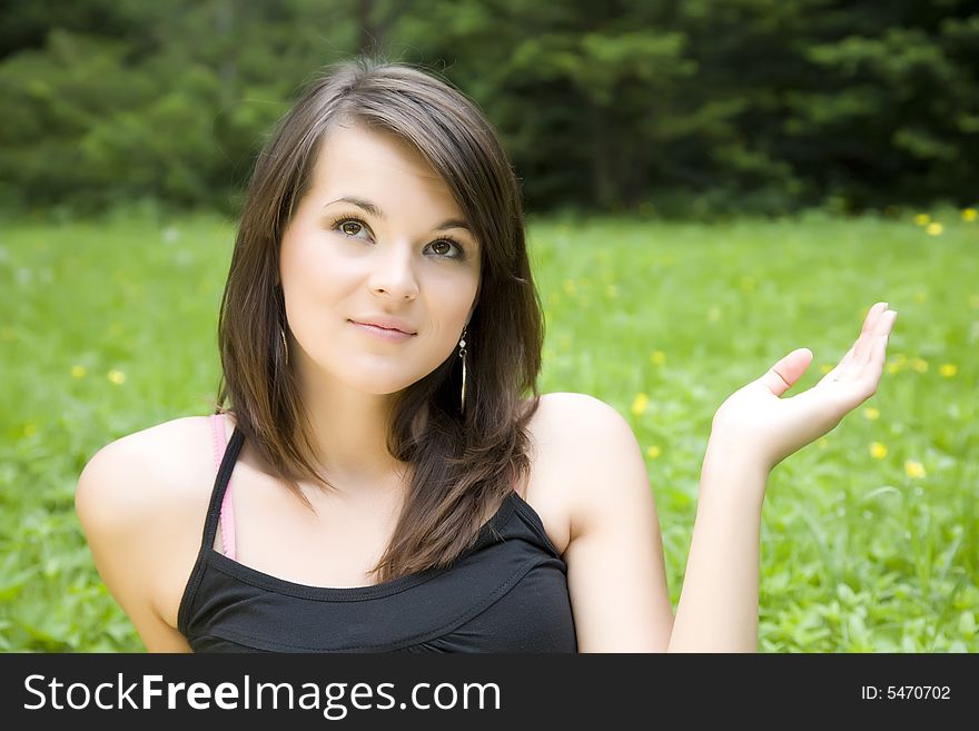 Surprised Young Woman On The Nature Background. Surprised Young Woman On The Nature Background