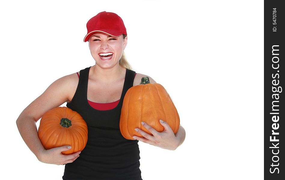 Pretty young woman carrying two pumpkins, isolated on white. Pretty young woman carrying two pumpkins, isolated on white.