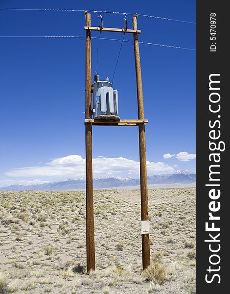 Transformer with mountains in the background.