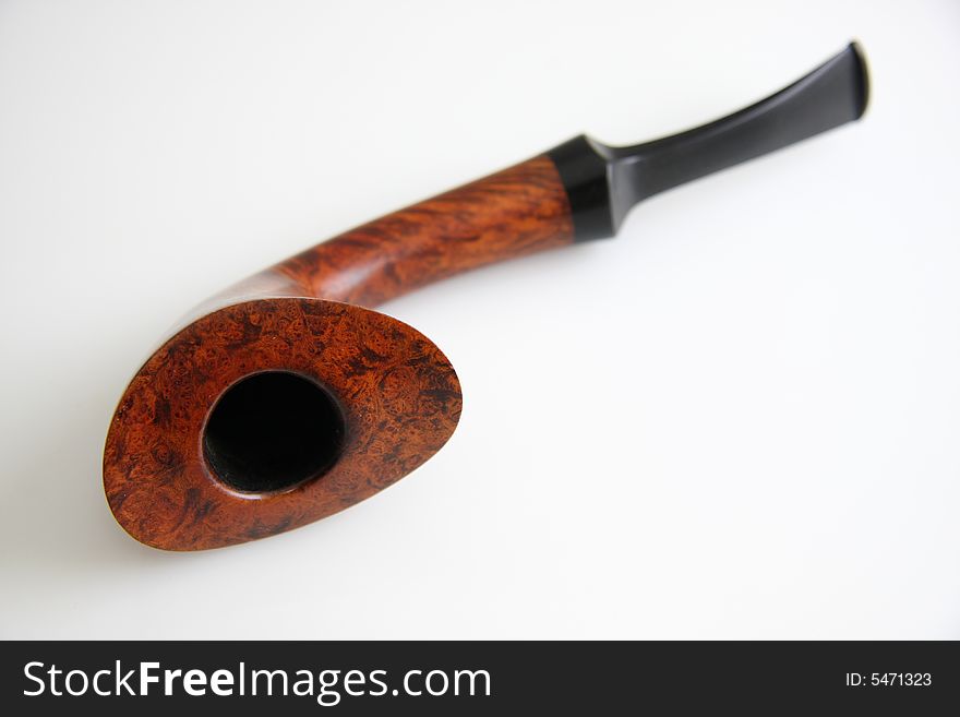 An tobacco pipe on white background.