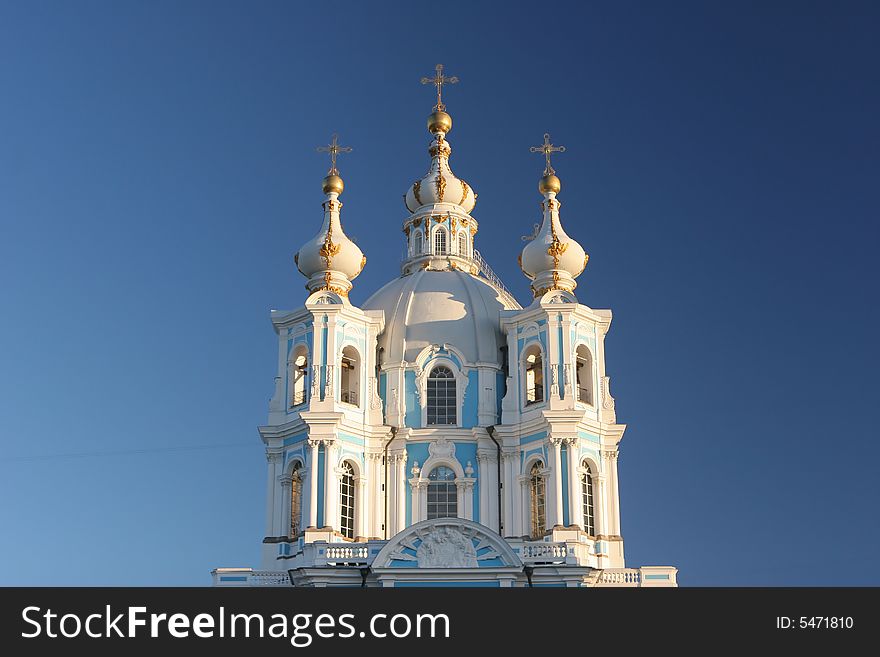 Domes on cathedral on blue background