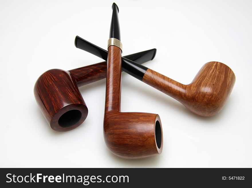 Three tobacco pipe isolated on white background.