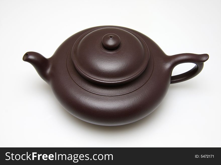 An teapot isolated on white background.