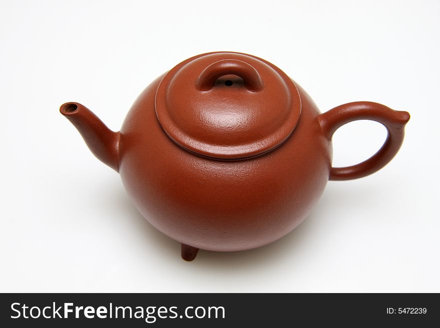 An teapot on white background.