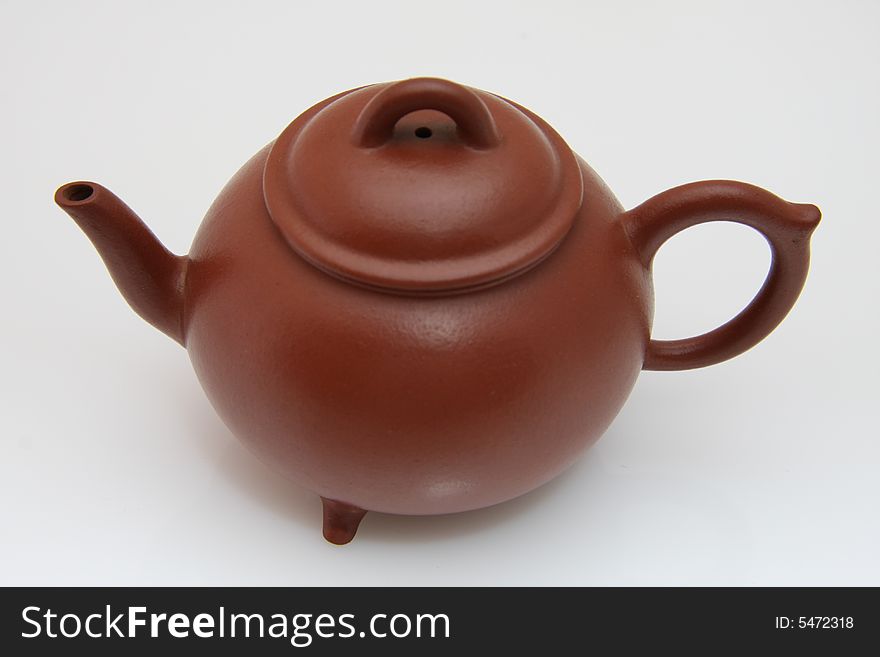 An teapot isolated on white from China.