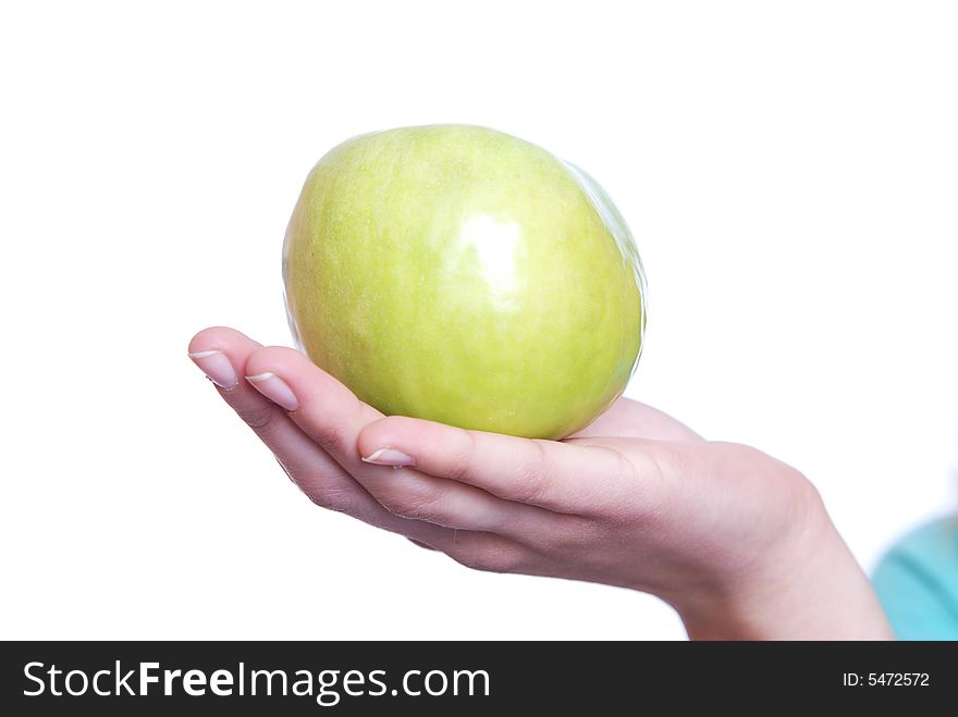 Apple on a hand on a white background