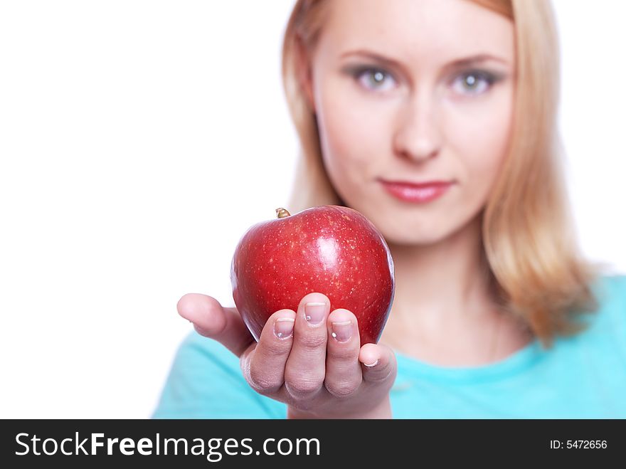 The girl with a red apple on a white background