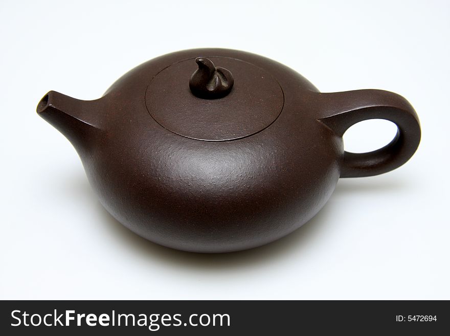 An teapot isolated on white background,also called zisha teapot.