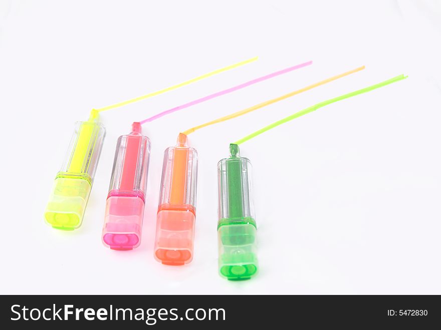 Four different color Highlighting Pens paralelled together