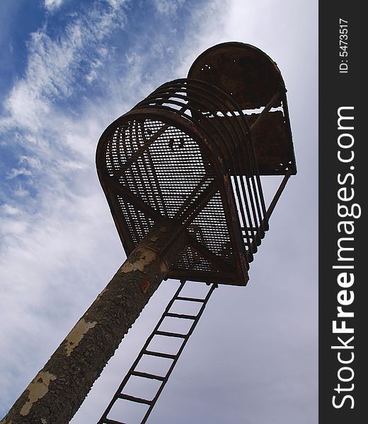 A run down lifeguard tower