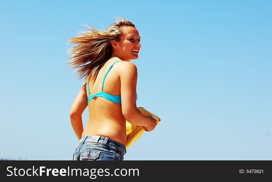 Young attractive woman enjoying summertime. Young attractive woman enjoying summertime