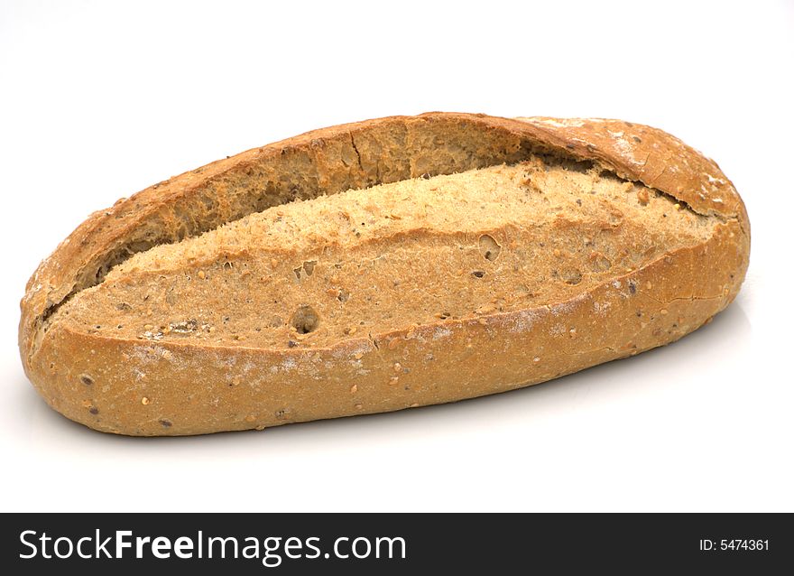 A rustic granary loaf isolated on white. A rustic granary loaf isolated on white