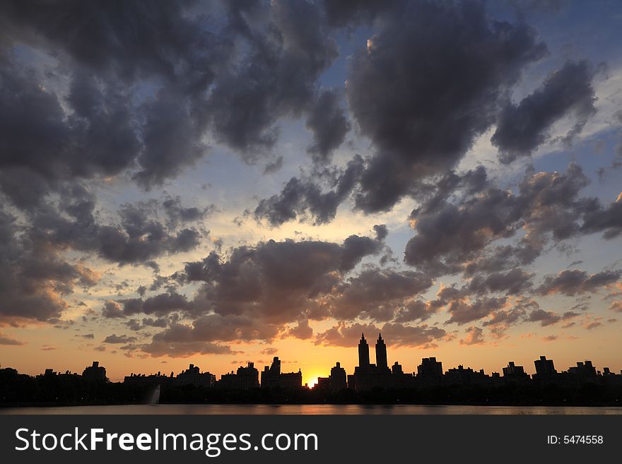 Manhattan sunset at the reservoir in summer in Central Park