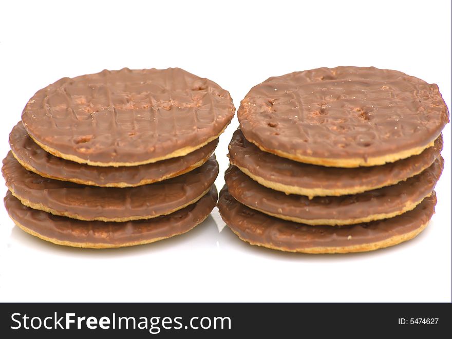 Two stacks of delicious chocolate biscuits,isolated on white