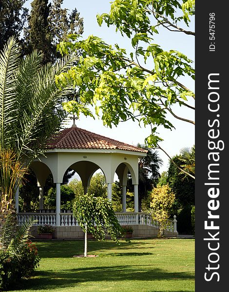 Kiosk in a park surrounded by trees