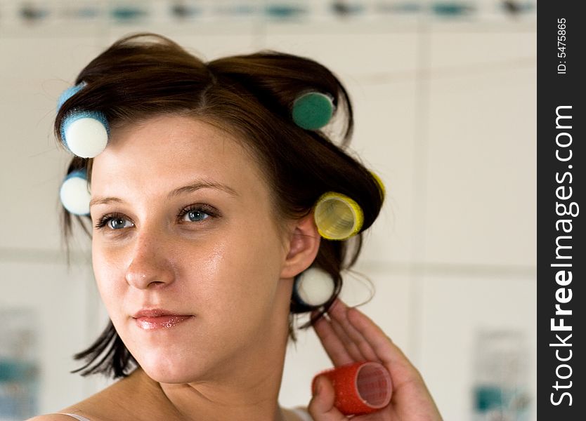 Woman with rollers on head