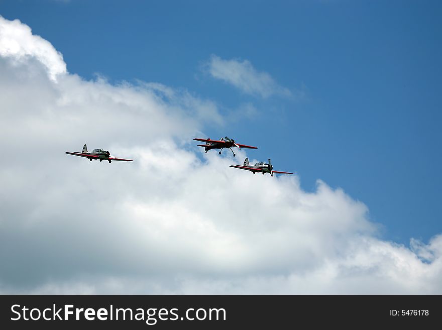 Air show in blue sky.