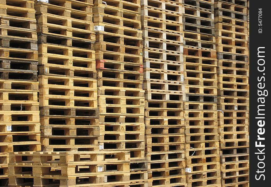 Stacks of wooden pallets for goods transportation