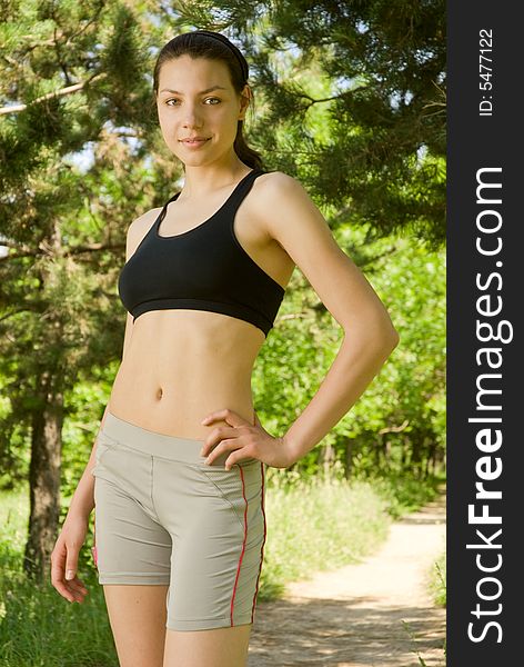 Young beautiful sporty woman outdoors. Young beautiful sporty woman outdoors