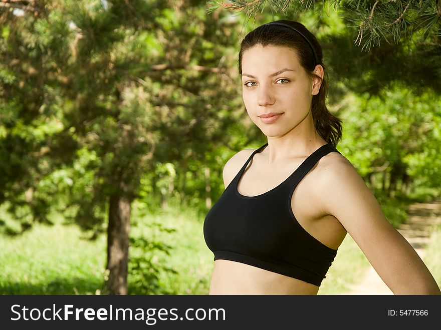 Close-up of young beautiful sporty woman outdoors. Close-up of young beautiful sporty woman outdoors