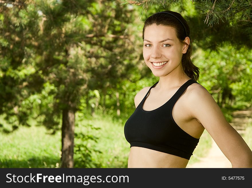 Close-up of young beautiful sporty woman outdoors. Close-up of young beautiful sporty woman outdoors