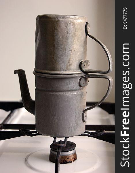 An old italian coffee maker. An old italian coffee maker