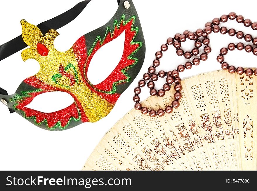 Mask, fan and beads isolated on white. Mask, fan and beads isolated on white