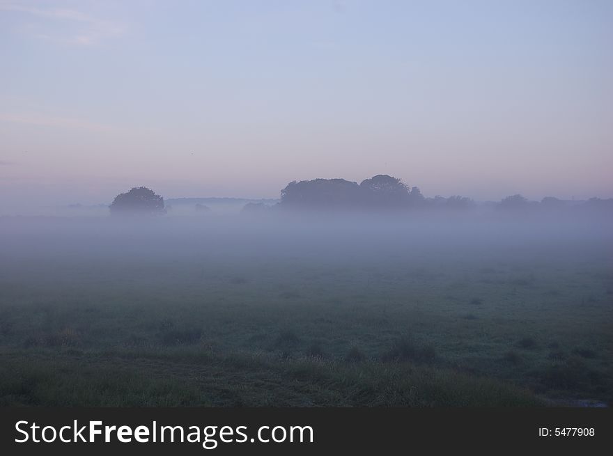 Picture of the fields in the mist overlooking my house. Picture of the fields in the mist overlooking my house.