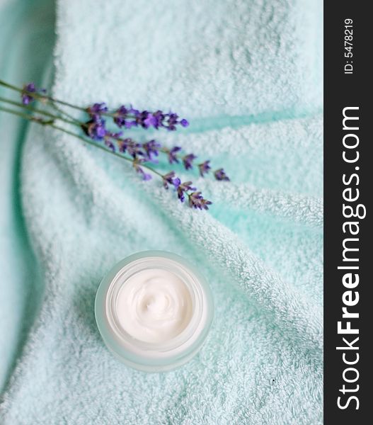 Natural creme over towels with lavender decoration. Natural creme over towels with lavender decoration