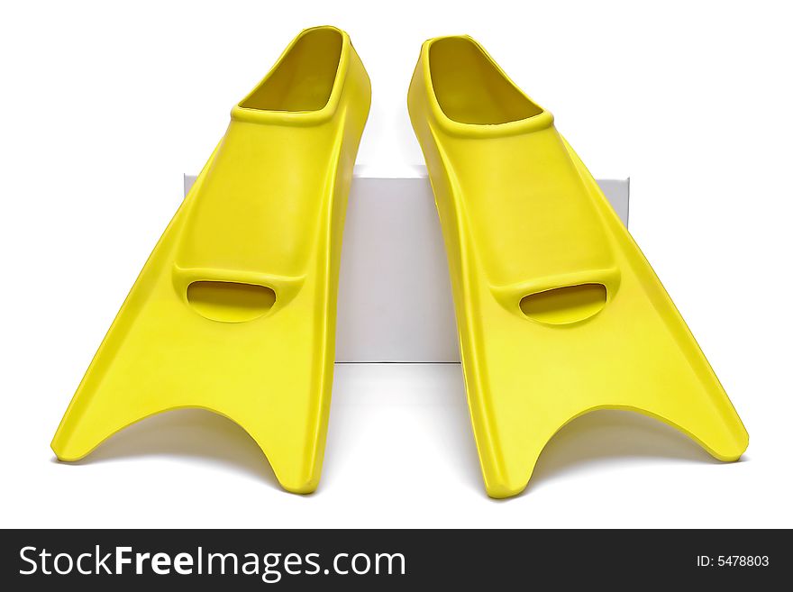 Yellow flippers on the white background stay on the box. Yellow flippers on the white background stay on the box