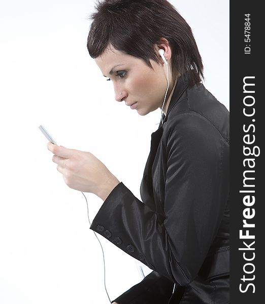 Girl with Mp3-player listening to the music