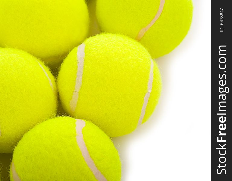 Several tennis balls on a white background with copy space. Several tennis balls on a white background with copy space