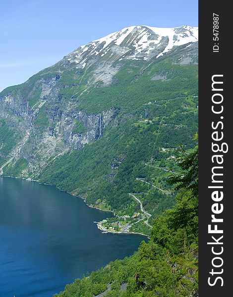 Ocean fjord in Norway, flying seagulls, green mountains. Ocean fjord in Norway, flying seagulls, green mountains