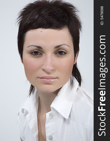 Portrait of a beautiful woman on a white background