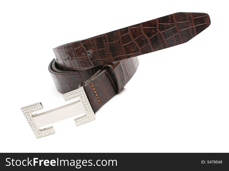 A rolled up lady belt isolated on white background.