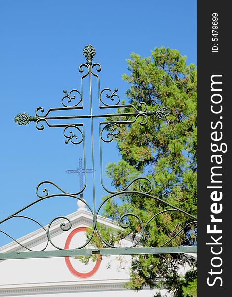 A small town catholic church with blue sky and crust. A small town catholic church with blue sky and crust