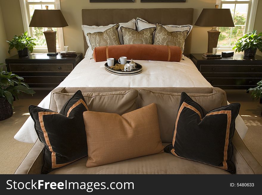 Stylish bedroom with contemporary furniture and decor. Stylish bedroom with contemporary furniture and decor.