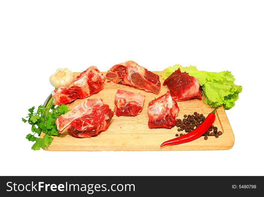 Fresh meat and vegetable isolated on white