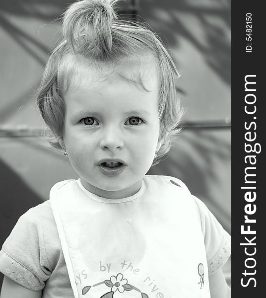 Black and white portrait of a beautiful little girl