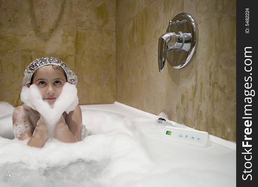 Small child happy and smiling in the bath. Small child happy and smiling in the bath