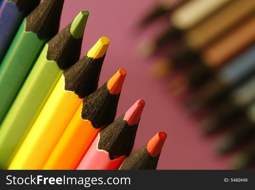 A part of  pencils with a simple  colorful background. A part of  pencils with a simple  colorful background