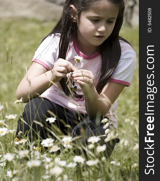 Little girl in the middle of a country field. Little girl in the middle of a country field.