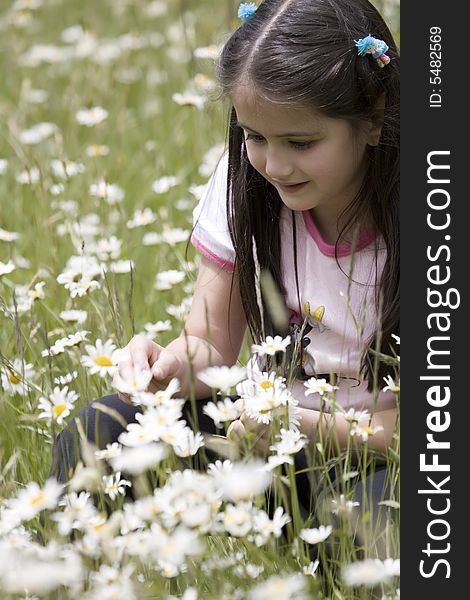 Little girl in the middle of a country field. Little girl in the middle of a country field.