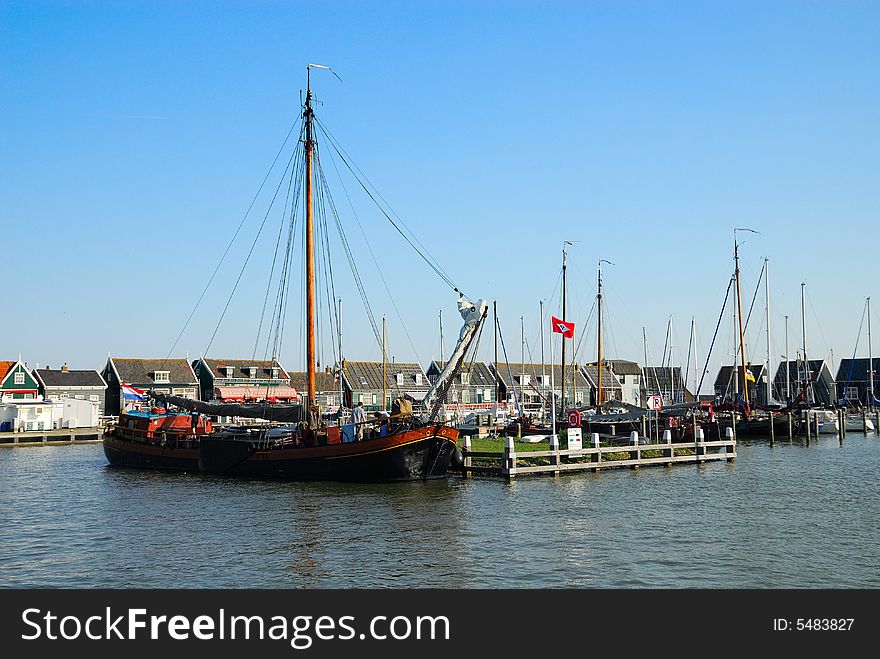 Old dutch houses and boats in Marken a small village near Amsterdam. Old dutch houses and boats in Marken a small village near Amsterdam