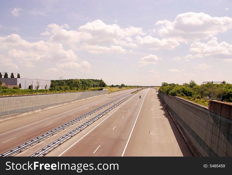 A very quiet highway at a sunny afternoon