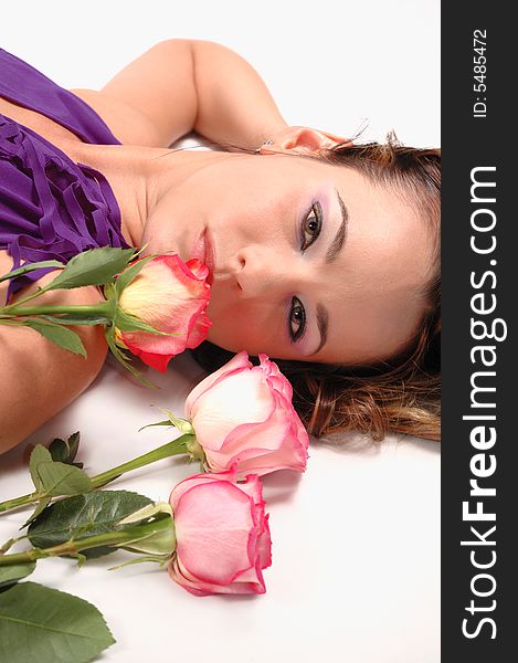 Portrait of young beauty with pink roses isolated. Portrait of young beauty with pink roses isolated