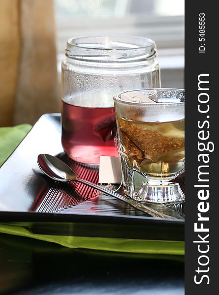 Healthy herbal tea on a table set for two. Healthy herbal tea on a table set for two