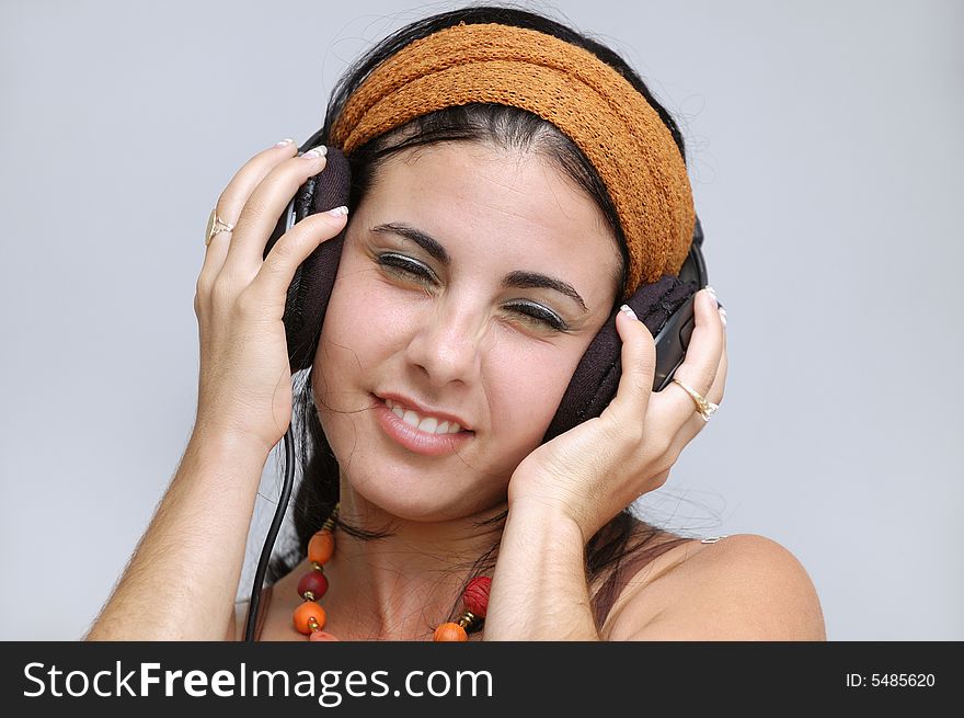 Portrait of hispanic girl wearing headphones. Portrait of hispanic girl wearing headphones