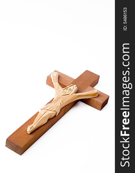 Christian wooden cross isolated on white