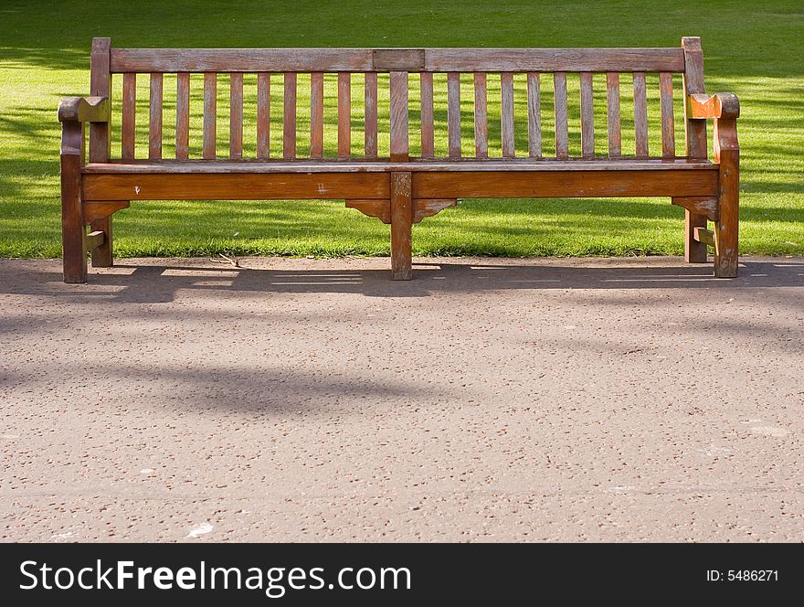 Alone single wooden bench in edinburgh park. Alone single wooden bench in edinburgh park